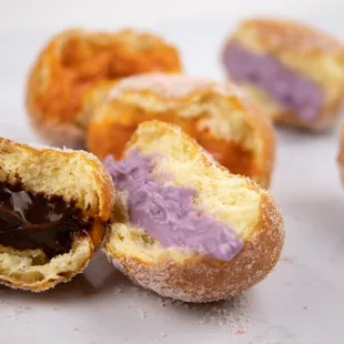 a half eaten doughnut with a bite taken out of it