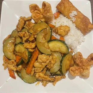 Zucchini chicken in a savory sauce, with steamed rice, egg roll, and two rangoons-#8 lunch special