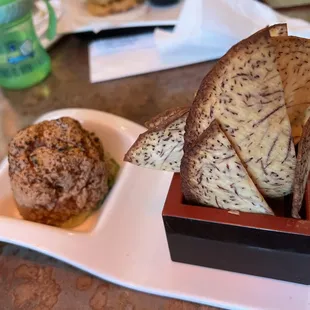 a plate of food and a muffin
