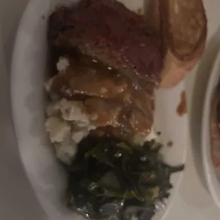 Meatloaf, mashed potatoes and collards
