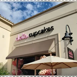 the outside of a cupcake shop