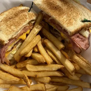 Club sandwich and fries