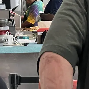 Cooks with the plates sitting on the grills