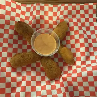 Delicious jalapeño poppers.. no need for a fast food stop on the way home when you conveniently have food at the bar!