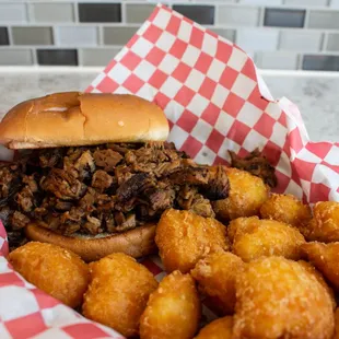 Chopped brisket sandwich with corn nuggets