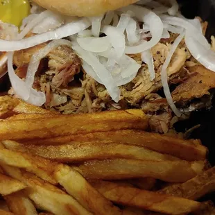 Pulled pork with added onions &amp; pickles from their complimentary toppings bar.