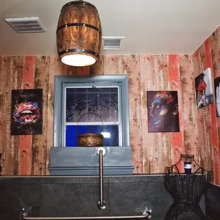 a bathroom with wooden walls