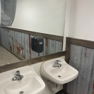 two sinks in a public restroom