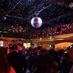 a disco ball suspended from the ceiling