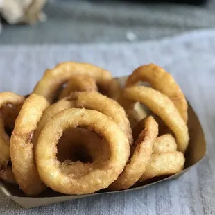 a basket of onion rings
