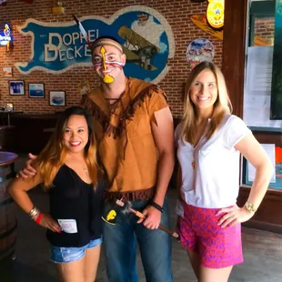 three people posing for a picture