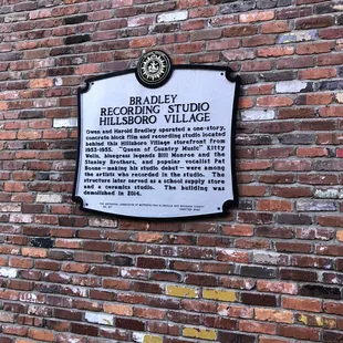 plaque on brick wall