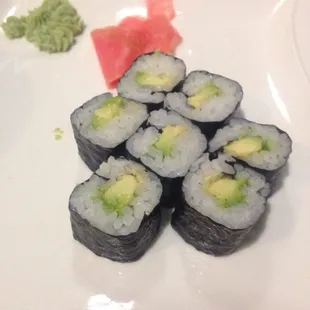 Partially eaten avocado roll