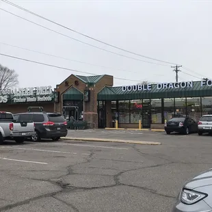 two cars parked in a parking lot