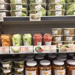 a variety of jars of pickles