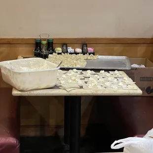 Food being made on the table in the dining room