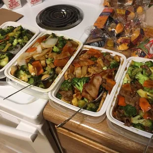 Broccoli with oyster, mixed Chinese vegetables, triple delight, beef with broccoli (left to right)