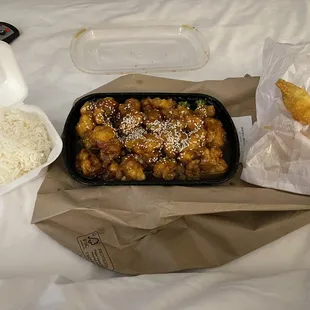 Sesame chicken and crab Rangoon from my hotel bed