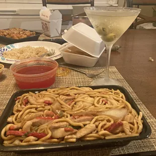 Double Dragon.  House Special Lo Mein, Dry Martini, and Sesame Chicken with brown rice in background.