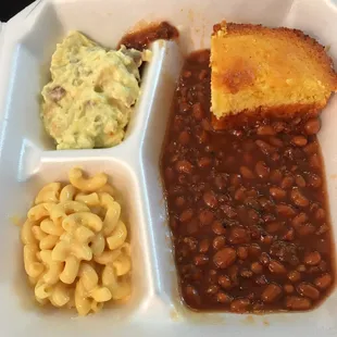 a plate of beans, macaroni and cheese
