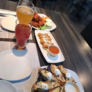 Wings, mozzarella sticks, potato skins