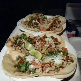 8 Chicken Tacos

Our tacos include onions, cilantro, tomato, guacamole, hot sauce, and cotija cheese.