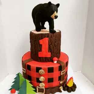 a cake with a bear on top
