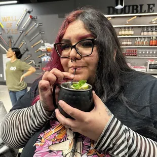 My beautiful wife drinking her mule!