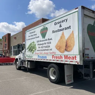 a delivery truck parked in a parking lot