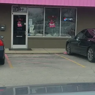 Look for the pink awning