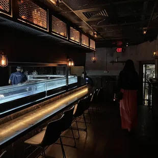 The downstairs kitchen/sushi bar area