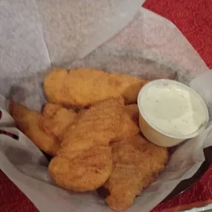 Chicken Tenders 
Have them tossed in Buffalo or BBQ Sauce