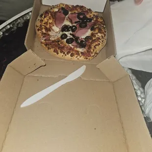 Pizza with olives and ham