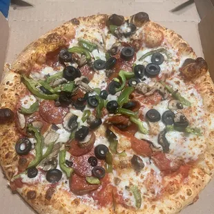 Pepperoni, olives, mushrooms and bell pepper medium pizza