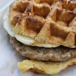 Waffle sandwich with sausage &amp; egg