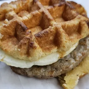 Waffle sandwich with egg &amp; sausage