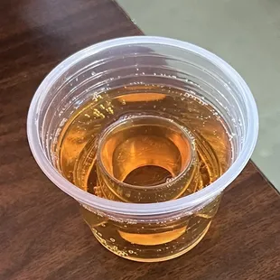 a drink in a plastic cup
