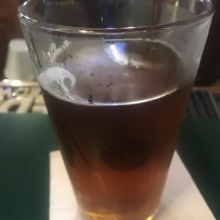 Yuengling on draft in a glass pint. You might have to request glass.