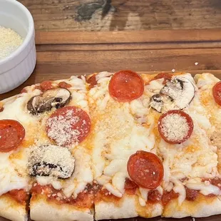 Pepperoni and mushroom pizza