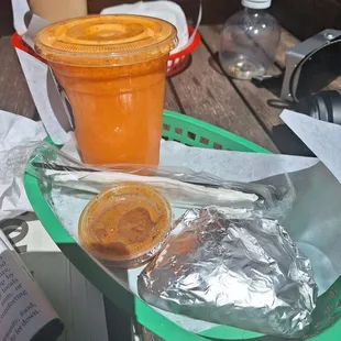 The carrot/orange juice and compost straws