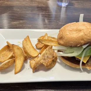 a burger and french fries on a plate