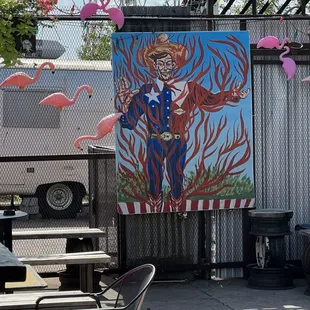 a painting of a man with a flamingo in his hand