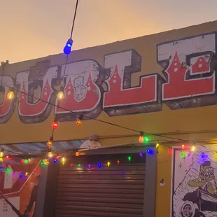 a neon sign for a restaurant