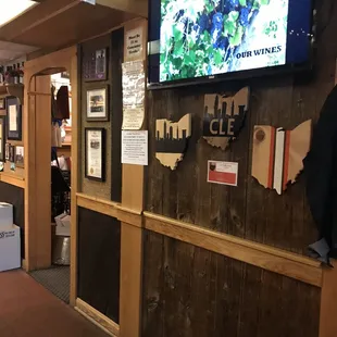 a bar with a large flat screen tv