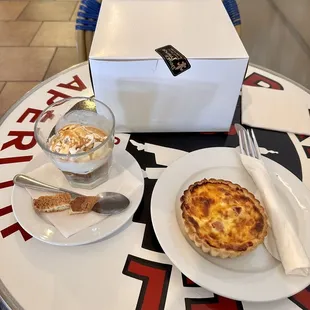 a table with a pie and a cup of coffee