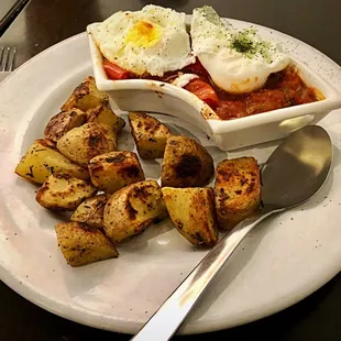 Ratatouille with poached eggs and roasted potatoes. Pretty tasty. They eggs look a little overdone but they were not.