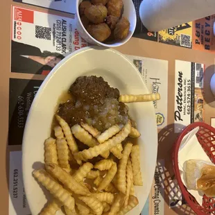 hamburger steak with fries and okra.