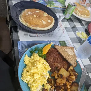 Hash and eggs with homefries and a pancake