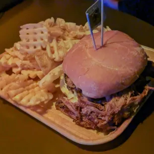 Notorious P.I.G., super delicious pulled pork sandwich.