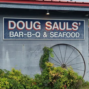 a sign for doug sauls bbq and seafood